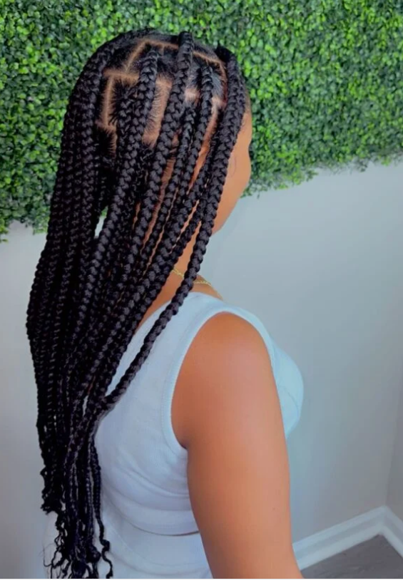 African hair braiding by Aida